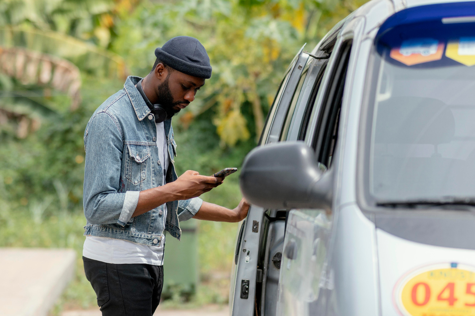Person using app to unlock car